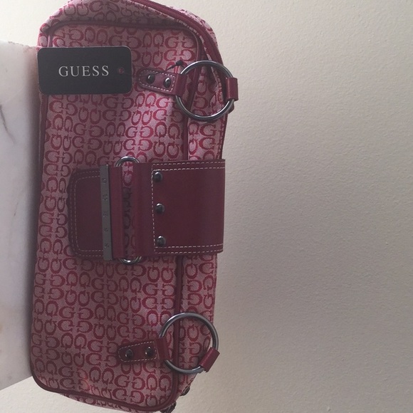 Guess Handbags - Guess red handbag with cream lining